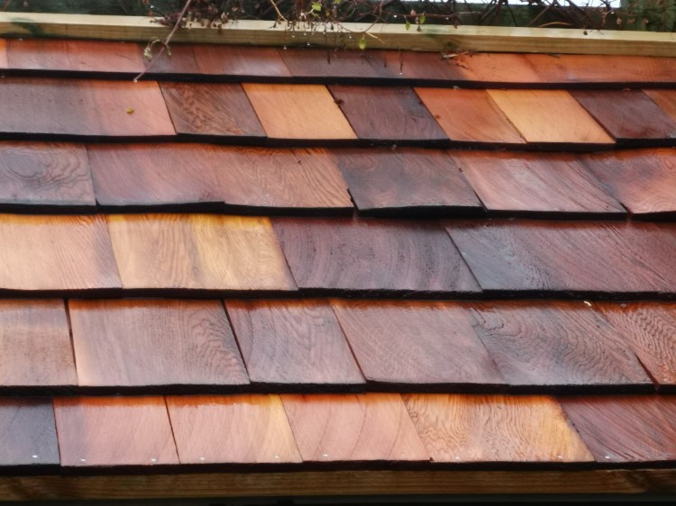Cedar wood tingles for the roof it should last a few years to say the least, 